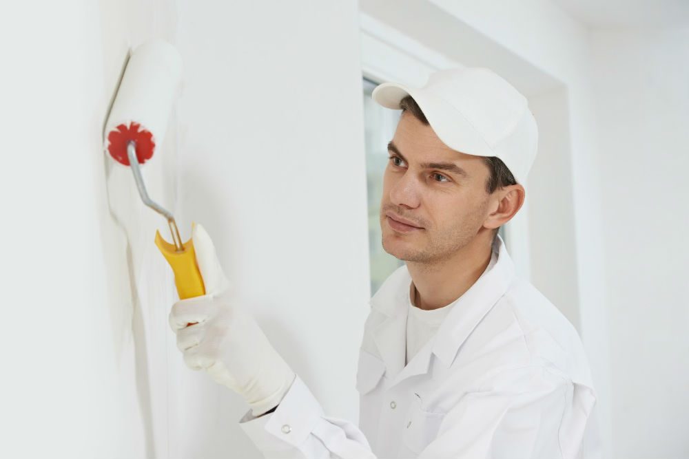 bigstock-One-male-house-painter-worker--38818072